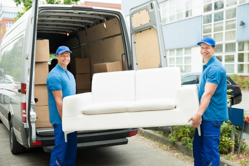 House movers in Surrey loading a family home move with care