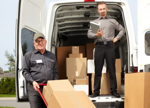 Commercial moving team planning an office relocation in Surrey