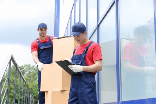 Helper transporting household items for a Surrey customer