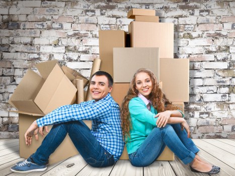 Donation-ready household furniture and boxes for charity reuse