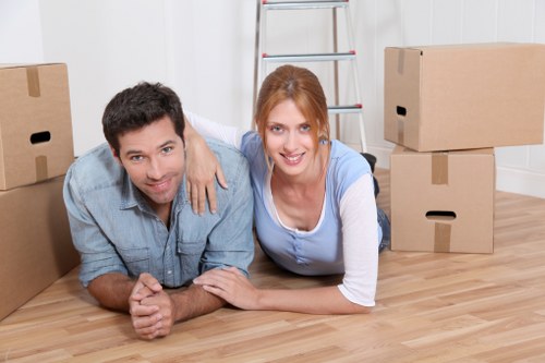 House removalists preparing a Surrey home move with furniture and boxes