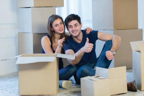 Loading furniture into a removal van in Surrey