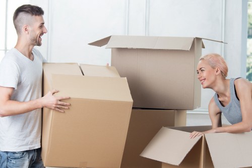 Packed boxes and furniture ready for man and van removals