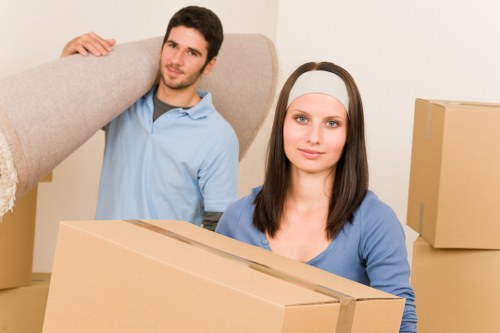 Loading household furniture into a removals van