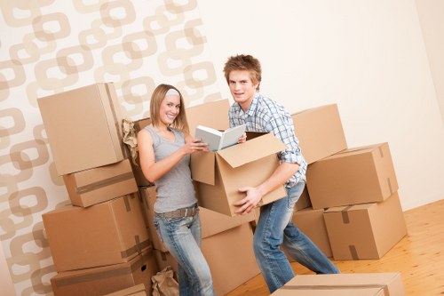 Local removals team handling furniture in Surrey