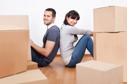 Packed boxes and furniture ready for transport during a Surrey removal