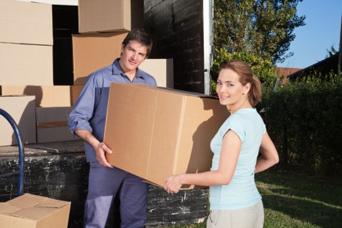 Removal team loading belongings for a Surrey moving day