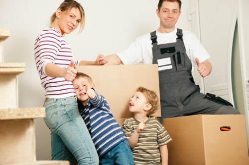 Packed office boxes and furniture ready for relocation